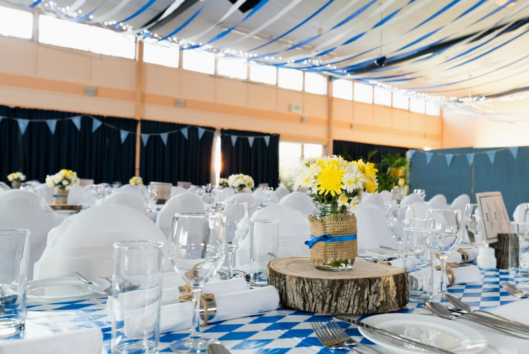 Event dining tables arranged for catered guests